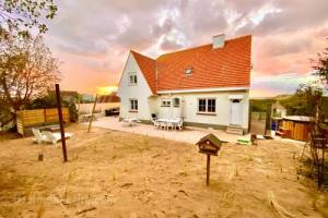 Villa Friedolin heeft zicht op zee en duinen, in duinenreservaat, hot tub met jacuzzi en sauna met zeezichten te Oostduinkerke - 1